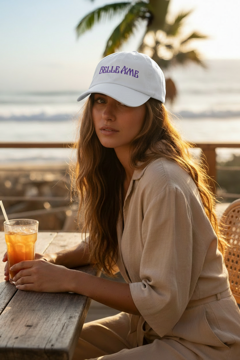 Belle Âme White Hat - Girl at Beachside Table
